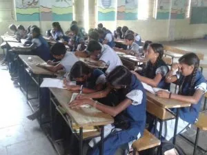 Students appearing for a Study Waves NGO scholarship examination