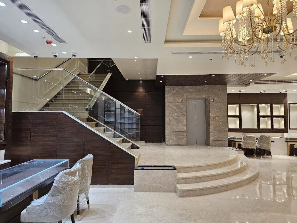 Staircase and chandelier inside the Aisshpra store, Lucknow